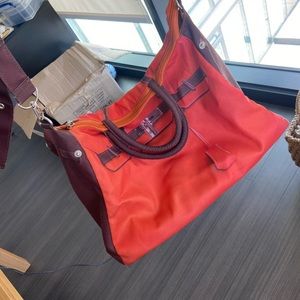 Orange nylon tote bag with handbag design